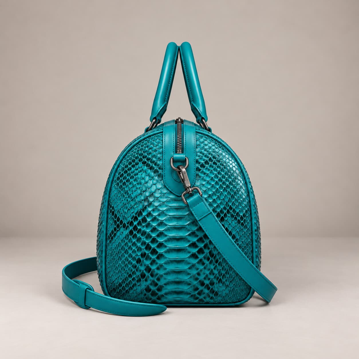 The Dom Bag in Turquoise, side view